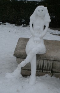 This ice princess was enjoying a day in the Plaza de Oriente with her favorite doll.