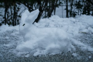 And another snow rabbit was sitting on a bench.