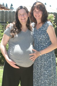 My sister Linda and I: Hmmm... can you tell which of us swallowed 2 small watermelons?