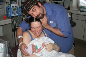 img_6530_mary_puck_dom Mom and Dad holding Dominic for the first time.