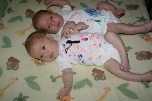 Dominic (front) and Alexander (back) in onesies decorated by our young friends Alex and Claire.