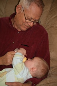 01_papa_dom_cute Dom helps Papa hold the bottle!