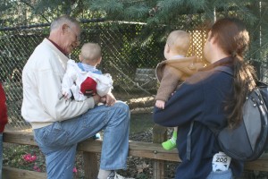 49_papa_dom_alex_dad Papa, Dom (left), Alex and Dad watch the otters playing.