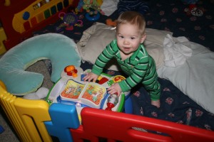 Alex loves to stand and play.