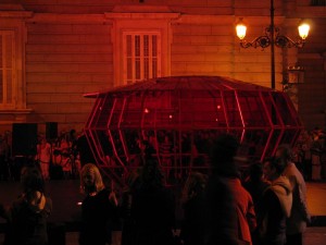 The Royal Palace in Red and a Giant Ruby with a trapped Celloist