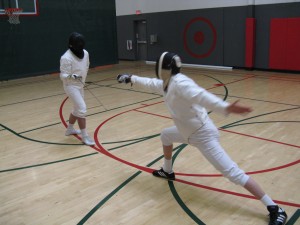 From the student's engagement in first, change beat of second and straight thrust.  The instructor parries in second and directs a riposte to the outside high line.  The student executes a passata sotto from the lunge.
