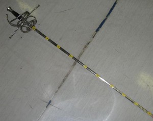 Sword with degrees marked in tape